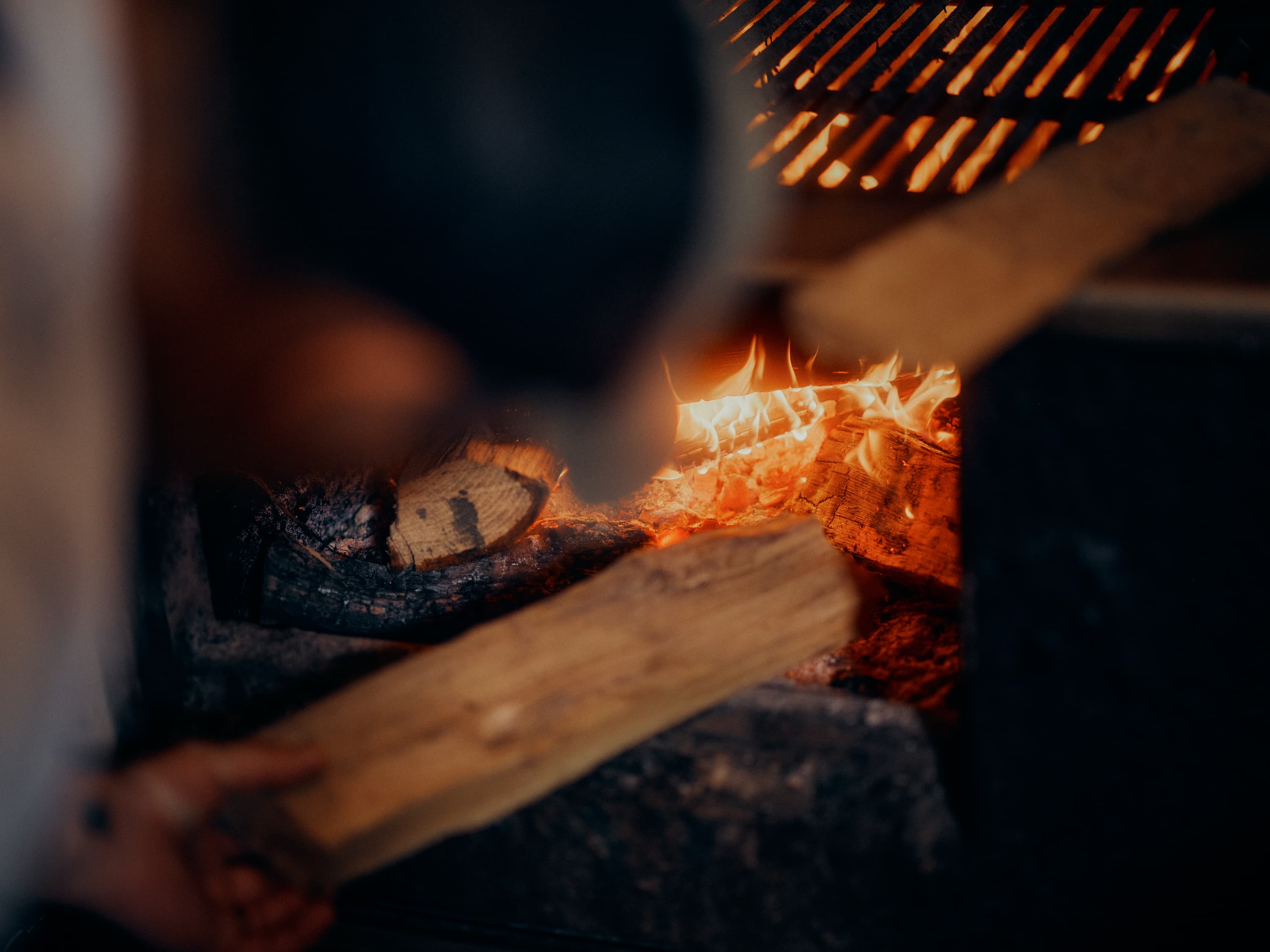 Flames rising in the wood-fired hearth at Rooster's